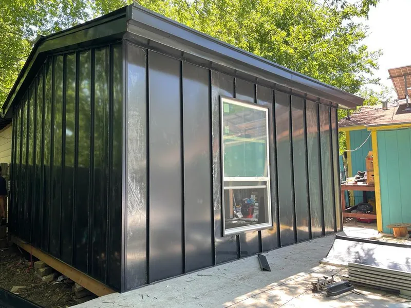 Black standing seam metal wall panels for Roof Inspection in Santa Clara